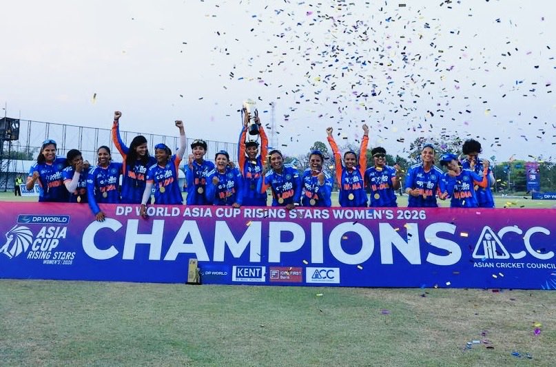 India Women's A team players celebrating with the Asia Cup Rising Stars 2026 trophy after defeating Bangladesh in the final