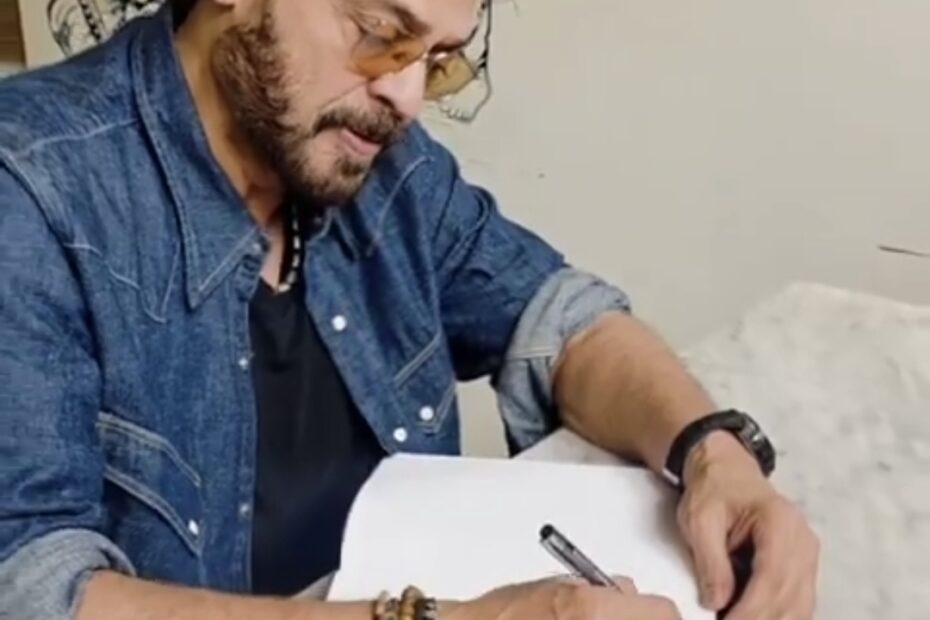 Tollywood actor Victory Venkatesh writing in the guest book at Vidyarthi Bhavan in Bengaluru