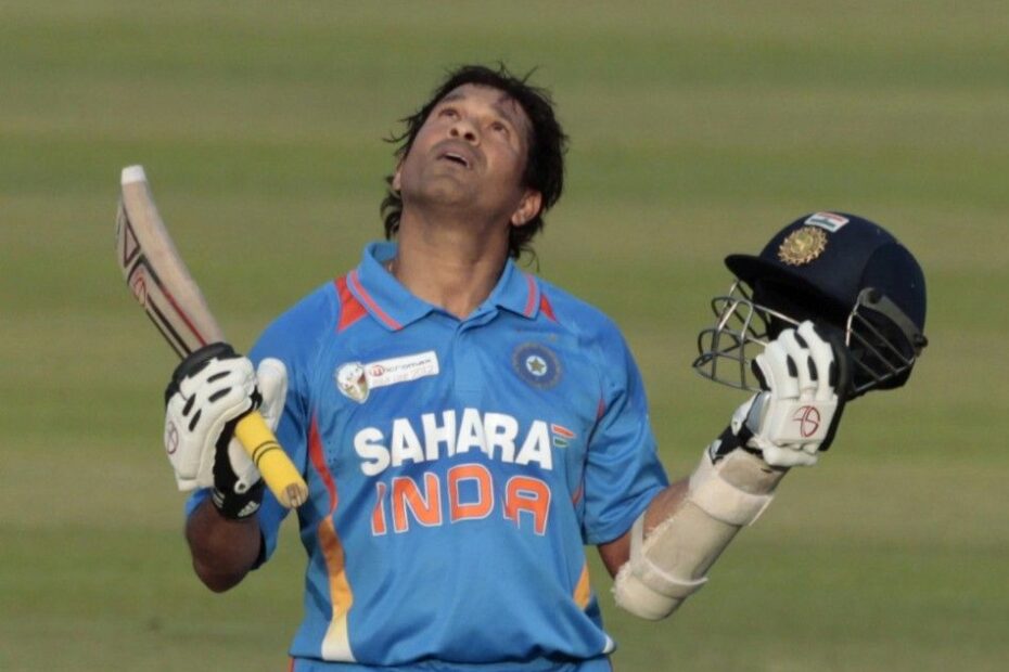 Sachin Tendulkar celebrates his 100th international century emotionally against Bangladesh in Asia Cup 2012 at Mirpur, looking to the sky with bat and helmet raised