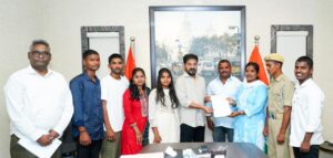 CM Revanth Reddy giving appointment letter to Tank Bund Shiva's son Venu Madhav.