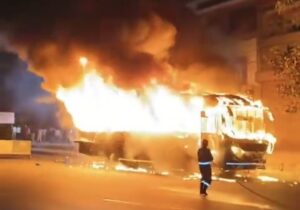 A private travels bus caught on fire in the middle of the road at KPHB, Hyderabad